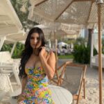 Mouni Roy Instagram - Yesterday we walked a while , picked up some flowers, ate a lot,read a lil, sat & lied down on the beach staring at the blank blue sky & then walked some more ... 📸 @nambiar13 Dubai, United Arab Emiratesدبي