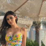 Mouni Roy Instagram - Yesterday we walked a while , picked up some flowers, ate a lot,read a lil, sat & lied down on the beach staring at the blank blue sky & then walked some more ... 📸 @nambiar13 Dubai, United Arab Emiratesدبي