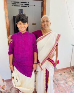 Navya Nair Instagram - Vishu with grand parents❤️❤️❤️
