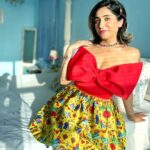 Neha Bhasin Instagram - Roses are red violets are blue Am wrapped as a gift just for you 🎁 Skirt @kristydecunha Top @thesource_buyorborrow Shoes @celine #NehaBhasin #fashionista