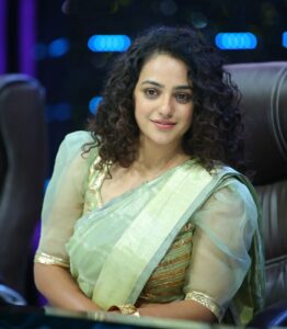 Nithya Menen Instagram - Ugadi at #TeluguIndianIdol :) 🌻🌾

Styled by - @poojakaranam @harmann_kaur_2.0
Blouse - @aindhribymahitha 
Jewellery- @abhilasha_pret_jewelry 
MUA - @makeupartistpj 
Hair - @meghna_hairstylist