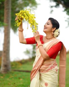 Sshivada Instagram - ഏവർകും ഹൃദയം നിറഞ്ഞ വിഷു ആശംസകൾ🌼🌻 Clicked by : @_shutter_magics_ MUA : @meeramax_makeupartist_ Assisted by : @sajeesh_s_0619_make_over Stylist: @kenusjoseph Saree : @ar_handlooms_kuthampully Jewellery : @shrishti__jewels Video: @the_motomatrix Assistant photographer:@_mr_travelholic_ Location : @udshotels . #vishu #vishuspecial #vishuvibes #wishes #setsaree #konnapoo #stayblessed #stayhappy #liveyourlife #loveyourlife UDS Hotels