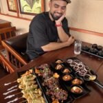 Tovino Thomas Instagram - Sneaking in another Cheat Day🤤 @somewherenice_restocafe #chickensataywithpeanutsauce #chickenhotguns #middleeastshots #beefdryfry #somewherenicerestocafe Somewhere Nice