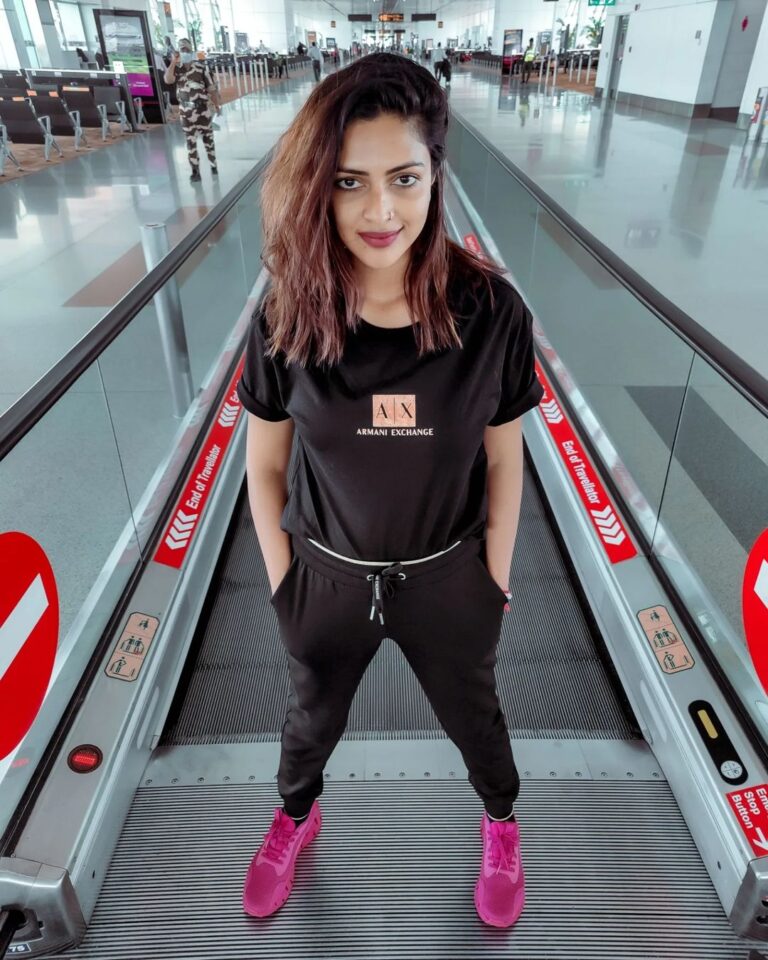 Amala Paul Instagram - Jet. Set. Go. And off I fly to my next destination. ✈️ #bittenbythetravelbug #airportscenes #traveldiaries #travelgram #trip #airportstyle #ootd #black #stylefiles