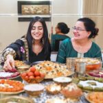 Amrita Rao Instagram - Happy Mother’s Day to all the L😍vely Moms out there! 🥂 Here's Mom & I, celebrating Her inspirational journey over a royal spread of biryanis, kebabs & desserts from the bessst we have in town @behrouzbiryani 😃😋 ✨ When most Mothers her age succumbed to societal norms, my mother broke the cliche and laid the foundation to be an independent woman. She didn’t give in to the family imposed guilt of quitting her job to look after me when I was born and resumed work just 45 days later. She was determined to strike a balance and she did! The journey wasn’t easy, but Mom made every bit of the ride worth it ! Not once did I ever feel the absence of her presence and care. Every day after school, I’d call and tell her & She’d be just a call away & not once said she was busy & could speak to me. ❤️ From sporting a boy cut hairdo then to wearing the clothes of her choice to riding a two-wheeler, mom has always done what she wanted to. She gave me the same freedom and space to be my own person and never imposed anything on me. ☺️ For someone so special, I only want to give her the bessst! 😍 Today, on Mother’s Day, I’m celebrating and saluting my Mom by treating her to a feast fit for a Queen 👑 - a royal lavish spread of mouth-watering biryani, delicious kebabs and indulgent desserts from Behrouz Biryani. Kyunki, kuch pal sirf Behrouz se khaas bante hain! #behrouzbiryani #biryani #mothersday #mothersdayspecial