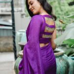 Anju Kurian Instagram - Purple does not manipulate, it influences 💜💜💜! Agree or disagree??? P.C- @pournami_mukesh_photography Styling - @joe_elize_joy Saree- @pastelsdesignstudio Jewellery- @tanishqjewellery Tanishq Edapally Location- @wudapple Asst styling- @sanliya_sabu