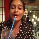 Archana Jois Instagram - Oh by the way, the straw isn't in the mouth,. It's the trick of the person who clicked it, which is me! 😁 @jois_vaishnavi #londoncurryhouse #photomagic #polkadots #sistersarethebest #mybff