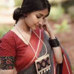 Archana Jois Instagram – Blush on her cheek..
Red was her smile..
And a saree flaunting the grace within..
He fell again!!
.
– Dhathree Hanabe

Saree, Jewellery, Styling, Concept & Curation – @laudable_drapes
Photography – @naveenvcphotography
MUA – @makeup_by_deeparachel
Hairstyle –  @makeovers_by_sudhavallabha
Location – @kadackalfarm 

 #pattedaanchu #indianweaves