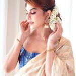 Jacqueline Fernandez Instagram - Have you listened to #RaRaRakkamma yet? 🤍 Link in Bio ! 💙