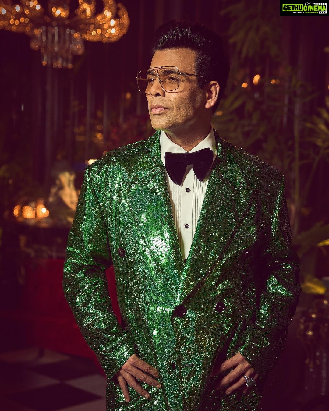 Karan Johar Instagram - Ok so it’s Christmas tree chic! But the Bling factor is intact! I am overwhelmed with the love and blessings but that didn’t stop me for being a serial poser, pouter and preener! Roz karenge pose✅ styled by @ekalakhani in @dolcegabbana hair @rajeev_gogoi make up @paresh_kalgutkar 📸 @sheldon.santos managed by the birthday boy @len5bm ! I am 50! Nazar na lage mujhe!