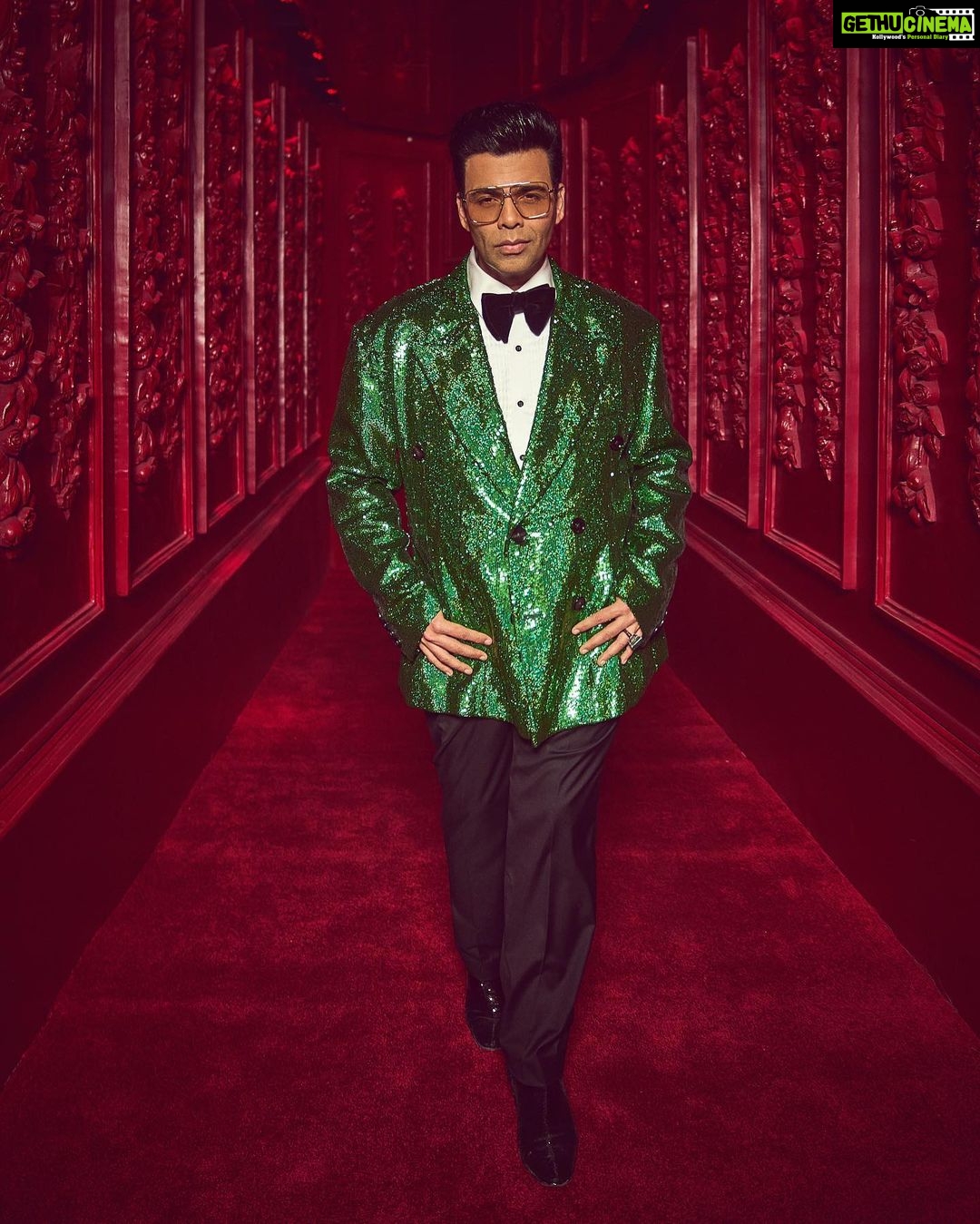 Karan Johar Instagram - Ok so it’s Christmas tree chic! But the Bling factor is intact! I am overwhelmed with the love and blessings but that didn’t stop me for being a serial poser, pouter and preener! Roz karenge pose✅ styled by @ekalakhani in @dolcegabbana hair @rajeev_gogoi make up @paresh_kalgutkar 📸 @sheldon.santos managed by the birthday boy @len5bm ! I am 50! Nazar na lage mujhe!
