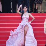 Meera Chopra Instagram - #cannes2022 #redcarpet moments!! Outfit - @sophiecouture Jewelry - @blingvine Sandals - @shoemill.in Styled by-@victorconcepto @juhi.ali HMU - @makeup.cannes Photographed by - @ryanarbilo711 Cannes Film Festival 2022