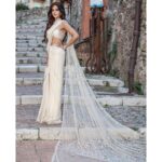 Meera Chopra Instagram - White vision at #cannes2022 Saaree by - @malaandkinnaryofficial Earrings and neckpiece - @tipsyfly Rings - @myanayra @aurnument Bangles- @rubans.in @tikamdasmotiramjewellers Heels by - @monrowshoes Styled by - @juhi.ali Hmu- @makeup.Cannes Shot by- @richardbyugo Cannes Film Festival 2022