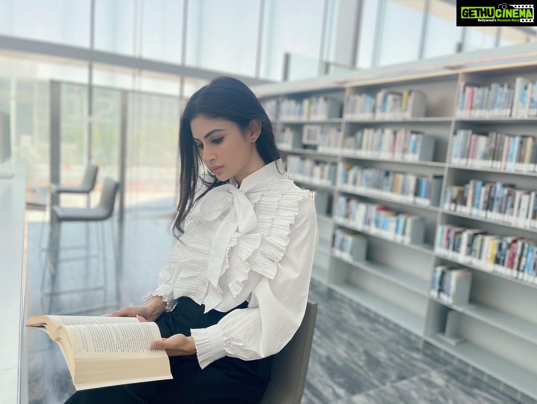 Mouni Roy Instagram - For some of us, books are as important as almost anything else on earth. What a miracle it is that out of these small, flat, rigid squares of paper unfolds world after world after world, worlds that sing to you, comfort and quiet or excite you. Books help us understand who we are and how we are to behave. They show us what community and friendship mean; they show us how to live and die….. In greatest company all morning.. the smell of books… aah!!!!! • • • Qatar is more than just beaches, good food and shopping. It’s a vibe with so much soul.. #QatarNationalLibrary @visitqatar Qatar National Library مكتبة قطر الوطنية