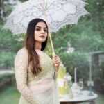 Nikhila Vimal Instagram - An open umbrella is just a closed beautiful sky💚 Outfit: @t.and.msignature Jewellery: @m.o.dsignature Photography & Videography: @studio360byplanj Decor: @blush.eventco MUA: @femy_antony__ Stlyist: @arjun_vasudevs