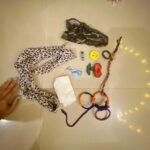 Pearle Maaney Instagram – Today I was cleaning the cupboards and this is What I found in one of his bags 💼 
The little gifts 🎁 that I gave him while we were falling in love. Even though we did not have the luxury to go shop for something special during that time.. we still made it happen. .
.
My scarf… that brought us together… we created a game where we would tie each other’s hands… my head band that eventually became his… the smiley badge… the cherry badge I gave him… a hand made gift made out of my bangles and thread… a little girl made out of  candy 🍬 wrapper… my hair band that went missing once 😉 … a watch strap that we used to play with and Kamal Sir’s autograph on a tissue paper 🌸 sometimes the most simplest of gifts become the most valuable gifts in our lives…❤️ @srinish_aravind #memories