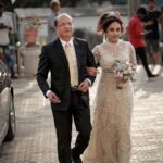 Pearle Maaney Instagram - Always Daddy’s Girl and I know he was the happiest on my wedding Day. His shoulders... I just love resting on... 😊😋 #daddysgirl Tears gathered in my eyes as I walked down the Aisle... happiest tears, because I was walking from one Hero... to another Hero. Two men who have changed my life... and has always brought out the best in me. #blessed 🌸 . . . . . @sainu_whiteline @labelmdesigners