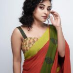 Pearle Maaney Instagram - @pearle.in presents The Yogi: saffron is the colour of tranquility and peace. A rare shade to find amoung sarees; this saffron and leaf-green saree with a contrast printed blouse is so unique! Woven in jute-crepe :it's a must have this season! . Buy this on www.pearle.in Use the promo code “PEACELOVEMUSIC” to avail a discount of Rs.1000 on this Saree! Limited Stock. And remember to share with us a picture of you wearing it so that we can see how you styled it 😋 . Material : Jute-Crepe Comes with the Same blouse piece . Post your photos under the hashtag #pearleclothing for us to share it. . Click @thestudioloc