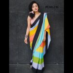 Pearle Maaney Instagram - You don’t have to let the rainbow remain in the sky always... drape it once in a while and be a rainbow 🌈 . Carelessly draped and worn casually.. making your denim jeans feel a bit jealous. . This Saree is your new Casual wear ❤️ Saree : @pearle.in . . 📸 @sk_abhijith