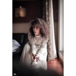 Pearle Maaney Instagram - It’s time to thank @labelmdesigners for this lovely Wedding Gown...for making my special day “Dreamy”. Also... I’ve found two amazing friends... Anu and Reshma.. the brains and soul of @labelmdesigners ❤️😘 . . . It’s an Ivory straight sheer gown The style that we adapted this time was very Victorian in aspects of its detailing and cuts ! The silhouette is a minimal straight long gown with a slightly flared hem! Even though it appears to be very minimal as per its silhouette it has very maximalist details as it consists of various minute panelling and lace insertions . Every panel has been intricately embroidered separately by our extremely proficient craftsmen for months . An entire ivory rose garden has been appliqués and beaded intricately all over and a tinge of pale pinks and powder blues to accentuate its depths It’s very modern but extremely rooted to our ancestoral Victorian elegance. . . Heels from @inc5shoes @sainu_whiteline photography Event by @eventiaevents Make Up by @sebastian.miranda.3998