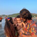 Pearle Maaney Instagram - Our 2022 looks absolutely colourful… We thank God For Everything and Our little Angel who makes our World Complete. We love You! Our Family ❤️ . Travel partner : @fortunetours Vagator Beach