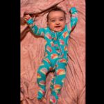 Pearle Maaney Instagram - Because A Baby’s Smile is the most beautiful sight…. And i want to share that privilege with all of You 🥰❤️ Hope her Smile makes you smile too… Your Nila Baby is all smiles before going to bed, Also All your Prayers Love and Blessings have kept her Happy Always. ☺️♥️🧿 . She is wearing her favourite @poshpeanut Footie Ruffled Zipper Onesie