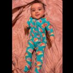Pearle Maaney Instagram - Because A Baby’s Smile is the most beautiful sight…. And i want to share that privilege with all of You 🥰❤️ Hope her Smile makes you smile too… Your Nila Baby is all smiles before going to bed, Also All your Prayers Love and Blessings have kept her Happy Always. ☺️♥️🧿 . She is wearing her favourite @poshpeanut Footie Ruffled Zipper Onesie