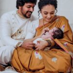 Pearle Maaney Instagram - Holding our whole world in our arms ❤️ . @srinish_aravind 🧿 . @anwarpattambiphotography @makeupandhairbysagallya