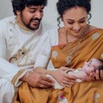 Pearle Maaney Instagram - Holding our whole world in our arms ❤️ . @srinish_aravind 🧿 . @anwarpattambiphotography @makeupandhairbysagallya