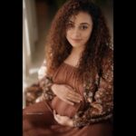 Pearle Maaney Instagram - As a woman I’ve never felt so blessed before... to know that there are two hearts beating inside me at the same time... to know there is a another life that’s going to be completely different from mine, growing within. To be a door for a new being to enter into this world... Women were born Empowered... And we know that... and Men... they Protect, Love, Support and Shield us during this wonderful process ❤️ patiently waiting to show the World, to the ‘little one’ through their Eyes. ❤️ just how i see it... and Life... Goes On. 💎🧿 . . Wearing @shristichetani.kolkata Styled by @aashishdwyer Styling Assisted by @_zuzanh_ Coordinated by @asaniya_nazrin Make Up by @femy_antony_makeup_artist Make up Assisted by @sarath.kumar86 Location @portmuziriskochi Photograph by @lightsoncreations Photgrapher @jiksonphotography Retouch by @a____p____t #LUDOmoviePromotions