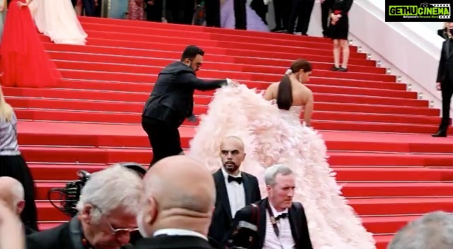 Pooja Hegde Instagram - The iconic red carpet stairs at the Cannes Film Festival. ❤️ What a rush this was 🥰 #grateful #cannes2022 #topgun
