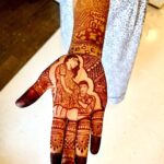 Sanjjanaa Instagram - #Mehendi is such a beautiful culture followed in every caste and creed of India .. I passionately took to being patient for a span of 2 to 3 hours with an acute pregnancy back pain still forcing myself to be patient .. to achieve this beautiful meaningful mehendi on my hands … My right hand has a “MOMTOBE“ mehendi tatoo embraced on my wrist & ABCD embraced too … so cute know ??? My right hand palm has pregnant woman embracing and feeling the moments of her baby in her womb , with her husband trying to hear the baby movements too … My left hand has a “ DAD TO BE “ tatoo on my wrist with a “Welcome Baby“ note .. followed by on the palm I have a very beautiful sculpture of “ Yashodaa maiyaaa holding on to Shree Krishna Nandalal with the compassion of a Mother to her self … I would like to encourage today’s generation through this beautiful mehendi to always sustain our culture and let mehendi in its self not to be a thing of yesterdays in the Indian society .. I heart fully always support being #vocalforlocal specially when it is a small scale start up business I am always there to extend limelight towards them , there fore @mehendistoriesbykiran is my pic when it comes to Making your occasions more emotionally bond and rememberable ❤️ Photos by @happeningpixels Karnataka, Bangalore