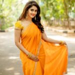 Surabhi Instagram - Wishing everyone a very Happy Akshaya Tritiya ..May this auspicious day enlighten our lives with happiness, good health & prosperity..🧡✨ Captured by @kiransaphotography ✨ Styling @nithishasriram ✨ Draped in this beautiful saree @kavithaguttaofficial ✨ Accessories @kiara.jewelry ✨