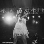 Andrea Jeremiah Instagram - Shimmying my way into the weekend 💛💃🏻💛 📸 @gotamphotography #onstage #thejeremiahproject #live #music #tamil #musician