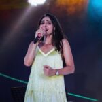Andrea Jeremiah Instagram - Shimmying my way into the weekend 💛💃🏻💛 📸 @gotamphotography #onstage #thejeremiahproject #live #music #tamil #musician