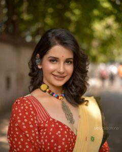 Angana Roy Instagram - Every city offers something unique for you to remember. As for my city, these yellow taxis are a takeaway.
There's just something about these yellow cabs that take me back to childhood, to a place full of endless hope.

@anushree_malhotra_designs thank you for making me look like this in your design!
Photography :@rieo_creations 
Makeup : @samitavod 
Hair : @bithi.roy.7712 

Organized by @inkcollab.pr 

✨

#design #sareelovers #loveforkolkata #yellowtaxi #yellowcab #calcuttadiaries #streetsofkolkata #redandyellow #shorthairstyle #streetphoto #childhoodmemories #designersaree #designerblouses #memories #redandwhite #yellowsaree #lookbook #tuesdaymood #tuesdayafternoon #tuesdayfeels #instaartsy #greenery #lovefromA
