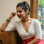 Angana Roy Instagram - Red and White kinda Sunday. 📸 @r.a.c.h.a.y.e.e.t.a Earrings by :@butterflytree.lifestyle Skirt by: @jewell.tthief.by.soumalini #sunday #latepost #redandwhite #summerstyle #rainyseason #endjune #ethnicwear #ethnicday #designerjewelry #whitetop #sundaynight #zouk #redlipstick #redaesthetic #randompost #nightpost #anganaroy #photoseries #lookoftheday #kolkatagram #lovefromA