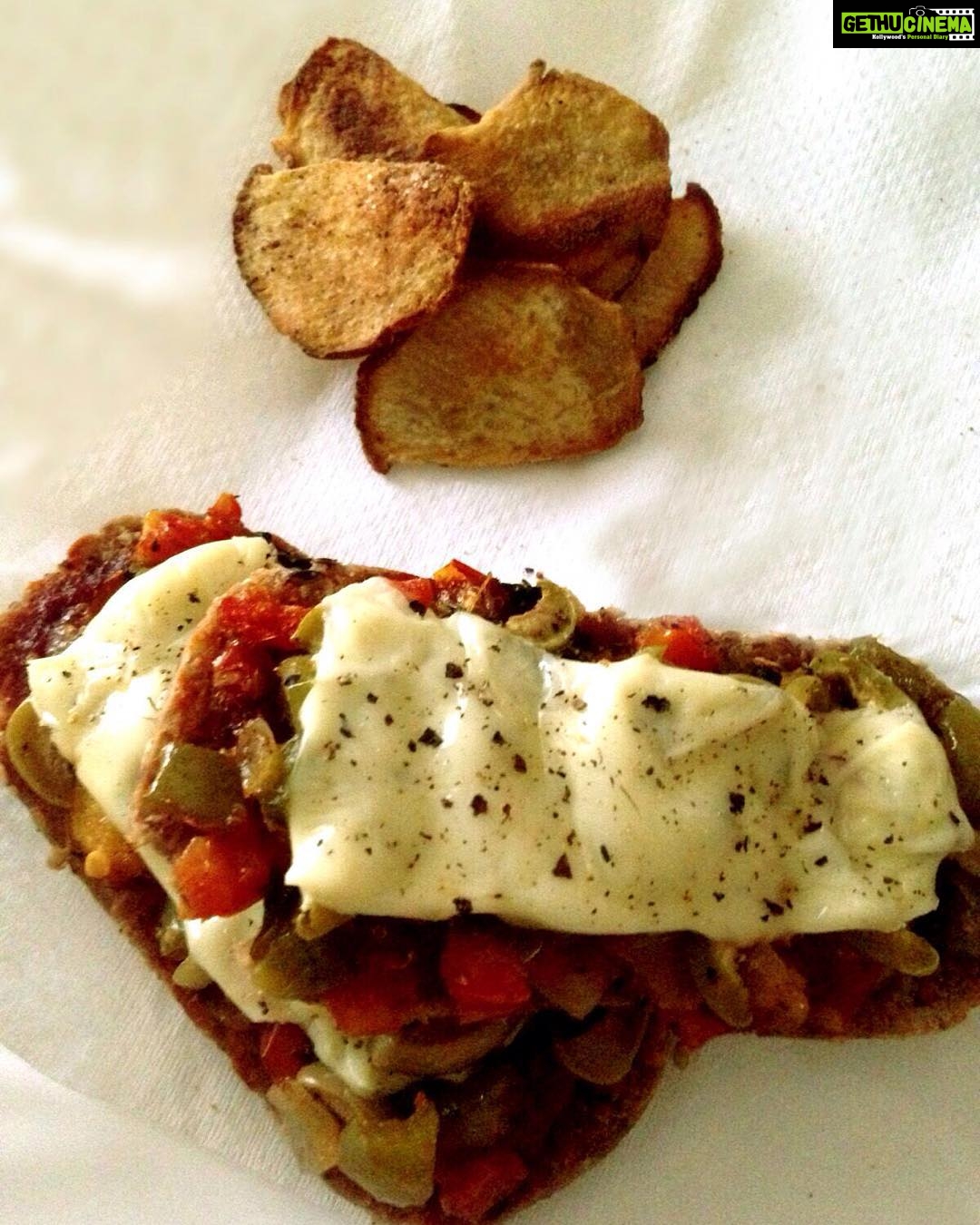 Bhumi Pednekar Instagram - Hello my favs... I am happy that some of you guys have tried out my fitness tips. But apart from these posts try researching a bit yourself. Try coming up with your own plan. Knowledge is power. This week I have a DIY recipe for you all *Woot Woot*. Presenting to you - the healthy open sandwich with sweet potato chips. recipe: You will need Whole Wheat or Multigrain Bread.I used home baked (microwave) gluten free bread that also had flax and sunflower seeds. (Try reading the calorie counter when you buy bread and get one that has less than 50 gms of carbs per 100 gms). Diced onions, sweet corn or baby corn, diced tomatoes, coloured peppers (red, yellow, green), olives, paneer, tofu or chicken, Low Fat cheese, fresh or dried herbs, Honey, Musturd sauce or some homemade chutney or pesto. Sauté the vegetables in a pan or cook the chicken or protein of your choice in very little olive oil and season with salt, pepper and herbs like parsley or thyme or oregano. On a toasted slice of bread spread the sauce (Homemade honey musturd or chutney or pesto). Heap up a scoop of the cooked mixture on the bread top with some low fat cheese (I split one slice into 2, or just skip it and drizzle some chilli oil instead) sprinkle some dried oregano and microwave it for 20 seconds. For the sweet potato chips cut one scrapped sweet potato in the shape of your choice, thinner the better. In a bowl mix olive oil, salt, chilli flakes (if you like it a little hot) Mix it all together, let the chips be covered well with the olive oil. Spread them individually out on a baking tray and bake them. I honestly microwaved them for about 25 mins (turn the chips after 15 mins) and they turned out pretty good. If not then just boil it or roast it, turn it into a mash - However you like. Yummy in my tummy and super healthy too! ✌️😎❤️ As always be happy, healthy and greetings for this festive season xx