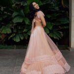 Deepti Sati Instagram - Deepti Sati (@deeptisati) in our Peach Lace lehenga set. 🧡🫶🏼 Featured here is our hand dyed peach lehenga set with delicate Chantilly Lace details. The blouse is heavily hand embroidered with frilled lace cap sleeves. The elaborate skirt comes in peach tulle with chantilly lace trims and lined with rich satin. Paired off with matching tulle dupatta with gold buttas.✨ DM to place your custom orders 🛒 Photographer: @clintsoman Makeup&Hair: @vijetha_karthik . . . #wedding #weddingdress #weddingoutfit #deeptisati #vocalforlocal #handembroidery #onlineshopping peachlehenga #lehenga #peach #lacelehenga #embellished #indiandesigners #bridal #lehengalove #bridalfashion #chantilly #lehenga #lehengas #indianwear #indianwedding #bridal #bridallehenga #chantillylace