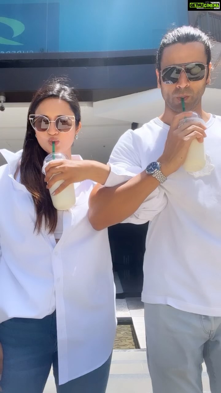 Divyanka Tripathi Instagram - Found a new way to drink our coconut milkshake. How many spins do you reckon we would have finished the drink in? 1. 32 2. 64 3. 98 4. None of the above