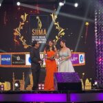 Kalyani Priyadarshan Instagram - Little gold statues, sparkly heels and my favorite people for company #siimaawards #aboutlastnight #varaneavashyamund A big thank you to everyone who voted for me. Means the world ♥️