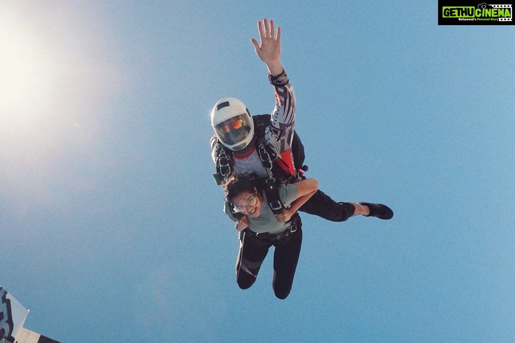 Kalyani Priyadarshan Instagram - Smiling outside, crying inside. ✈️☀️☁️🪂 Skydive Dubai