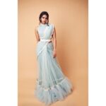 Kalyani Priyadarshan Instagram - For the #chitralahari pre release event Powder blue tier saree, glass beads embroidered blouse & white bow belt by @archanaraolabel Diamond floral studs by @akoyajewels Bracelet by @harinifinejewellery Fashion Stylist @styledbyindrakshi Fashion Assistant @rishi_chowdary Photograph by @akshay.rao.photography