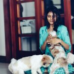 Kalyani Priyadarshan Instagram - My dog hasn’t been paying much attention to me lately. So I asked someone to take some pictures while I play with other dogs. Now I’ll post these up and show it to him... see if he gets jealous. 😜 #masterplan #newbestfriends #jealousyet #messyhairdontcare #thethingsidoforlove #willthiswork