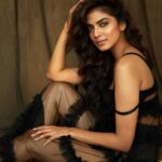 Malavika Mohanan Instagram - “As if you were on fire from within. The moon lives in the lining of your skin”🖤 . . 📸 @rahuljhangiani Styled by @triparnam Makeup @nittigoenka Hair @akshatahonawar Superman @theitembomb . . Thank you so much for the amazing amazing shoot guys! Lots of love ♥️