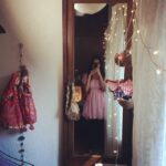 Malavika Mohanan Instagram – Putting up fairy lights on the curtains.