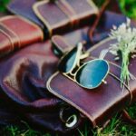 Malavika Mohanan Instagram - Favourite travel accessories, the good old aviators and the brown backpack.