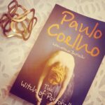 Malavika Mohanan Instagram - Currently #reading #Coelho #books #Brazilian #author