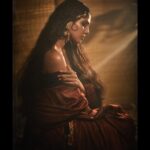 Malavika Mohanan Instagram - “The light that rises from your feet to your hair, the strength enfolding your delicate form, are not mother of pearl, not chilly silver: you are made of light, a light the fire adores” . . @rohanshrestha such magical photographs you’ve created 🧡 @nittigoenka I honestly can’t imagine anyone else having done this except you. 🧡 @the.mad.hair.scientist you amazing artist, you! Always wanted long, raw hair reminiscent of an Indian princess 🧡 @artcantbebothered love how beautifully you have used the drapes and the whole old world charm you’ve created. Uff! 🧡 @theitembomb for helping entertain us while the rest of us were working really hard 🤓