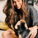 Malavika Mohanan Instagram - When you’re trying to get a good picture with a hyper-active puppy whose only interest at that point is to chew on your hair 🙄 🐶
